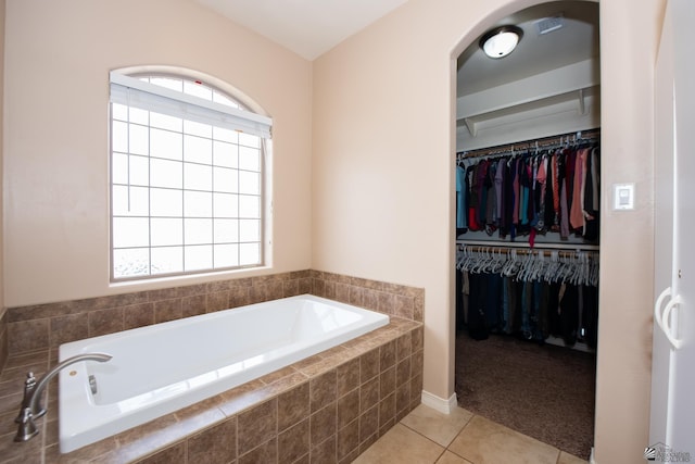 12127 E 35th St, Yuma, AZ 85367 - full bathroom with tile patterned floors, a walk in closet, and a garden tub