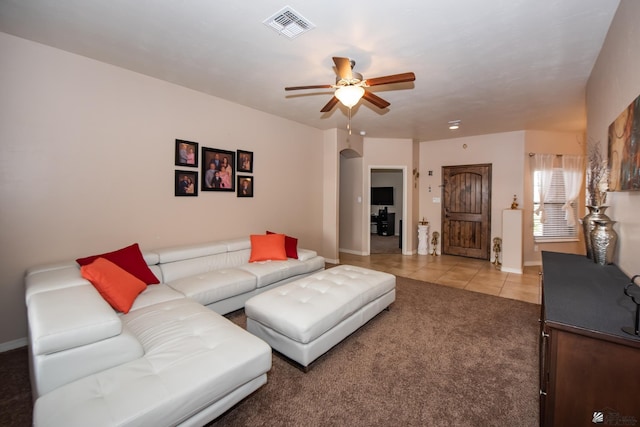 12127 E 35th St, Yuma, AZ 85367 - living area with baseboards, ceiling fan, visible vents, and light tile patterned floors