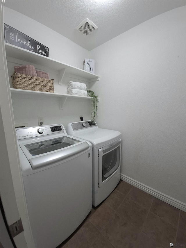 10178 S Cony Ave, Yuma, AZ 85367 - washroom with washing machine and dryer, baseboards, and dark tile patterned floors