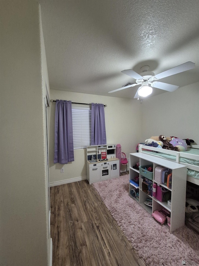 10178 S Cony Ave, Yuma, AZ 85367 - bedroom with wood finished floors, a textured ceiling, and ceiling fan