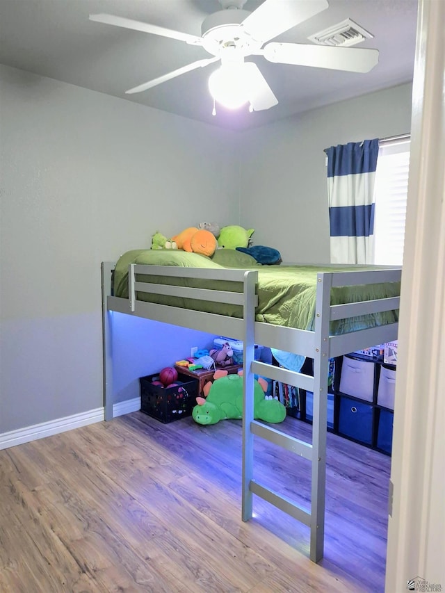 10178 S Cony Ave, Yuma, AZ 85367 - bedroom with wood finished floors, baseboards, and ceiling fan