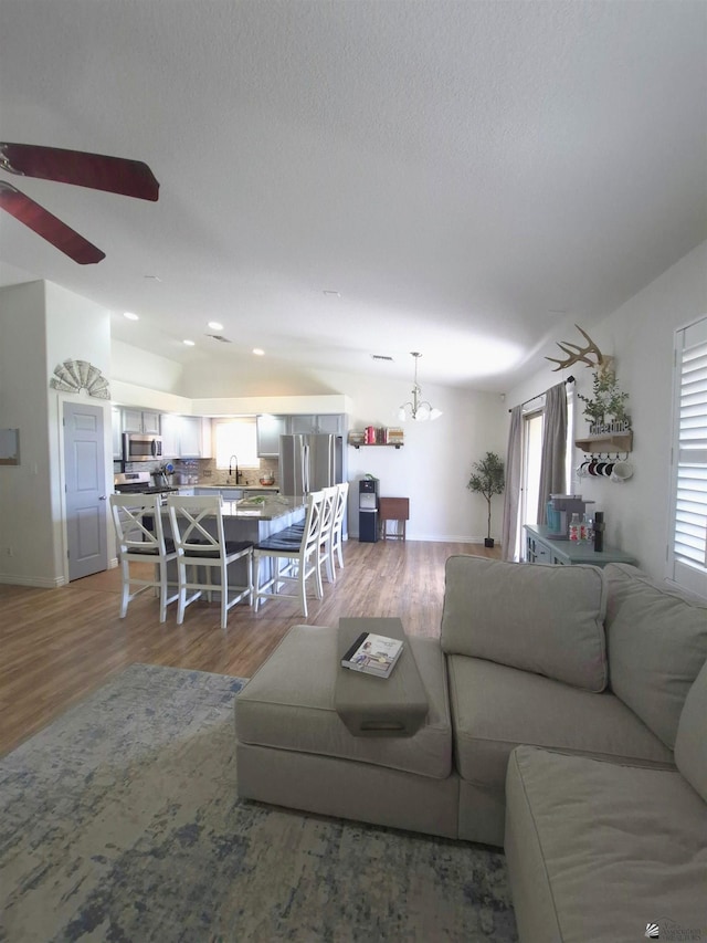 10178 S Cony Ave, Yuma, AZ 85367 - living area with ceiling fan, wood finished floors, a chandelier, recessed lighting, and baseboards