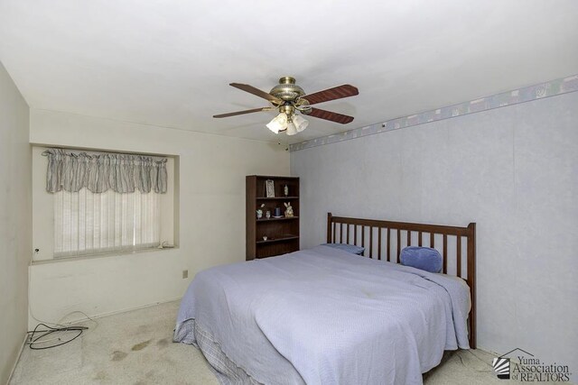 232 E 25th Pl, Yuma, AZ 85364 - carpeted bedroom with a ceiling fan