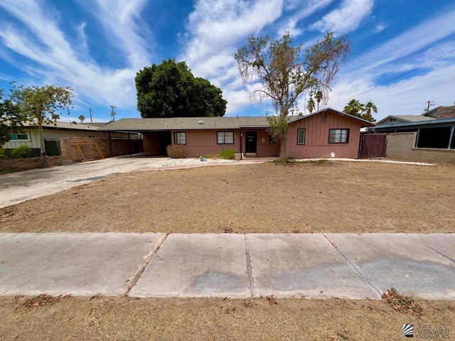 1550 S 7th Ave, Yuma, AZ 85364 - ranch-style home with concrete driveway and a carport