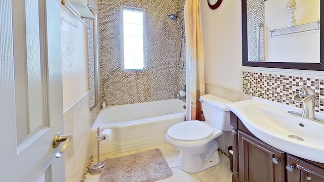 1550 S 7th Ave, Yuma, AZ 85364 - bathroom featuring vanity, shower / bath combo, toilet, tile walls, and tile patterned flooring