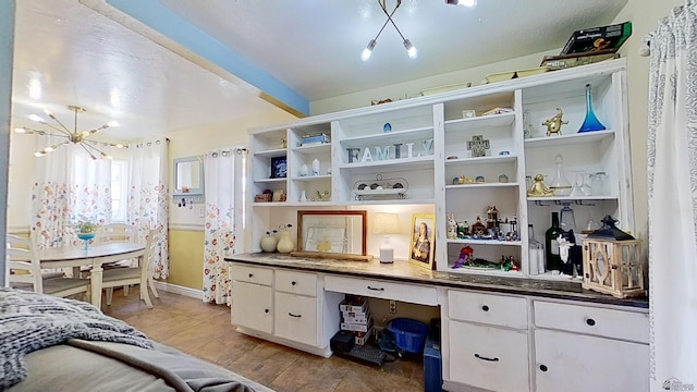 1550 S 7th Ave, Yuma, AZ 85364 - bedroom featuring a chandelier and baseboards