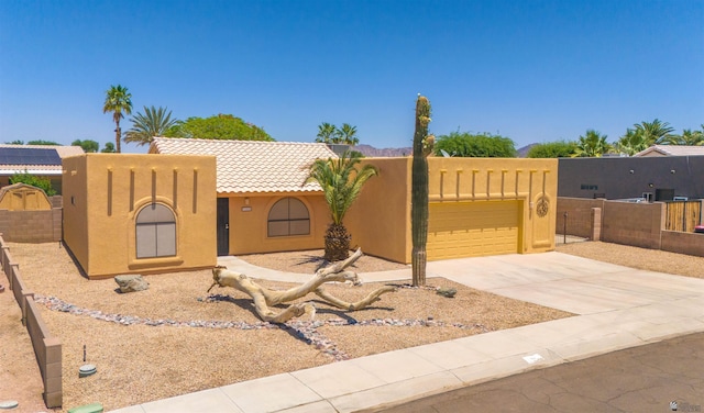 11212 E 37th Ln, Yuma, AZ 85367 - view of patio / terrace featuring an attached garage and concrete driveway