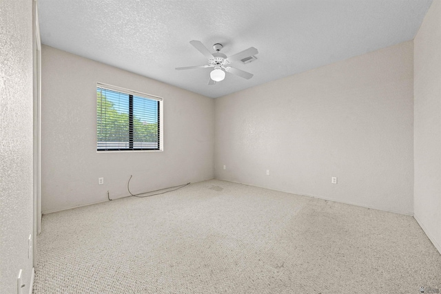 11212 E 37th Ln, Yuma, AZ 85367 - carpeted spare room with ceiling fan and a textured ceiling