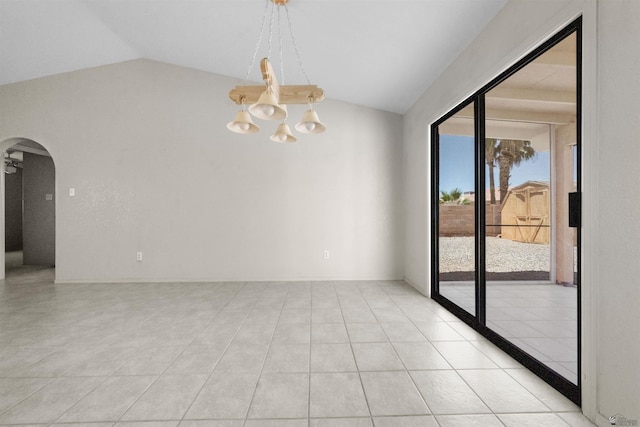 11212 E 37th Ln, Yuma, AZ 85367 - spare room with vaulted ceiling, arched walkways, a chandelier, and light tile patterned flooring