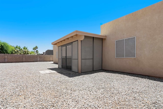 11212 E 37th Ln, Yuma, AZ 85367 - back of property featuring stucco siding and a fenced backyard