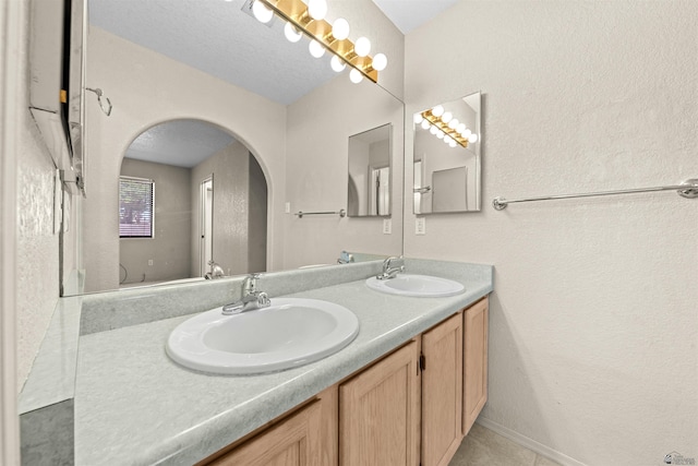 11212 E 37th Ln, Yuma, AZ 85367 - bathroom featuring double vanity and tile patterned floors