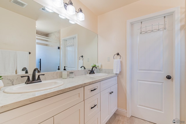 10237 S Monsoon Ave, Yuma, AZ 85365 - bathroom with double vanity and a shower