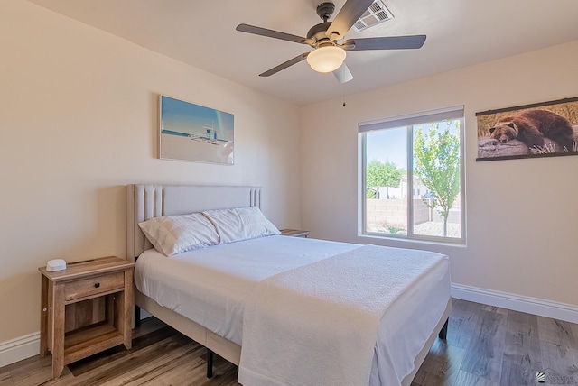 10237 S Monsoon Ave, Yuma, AZ 85365 - bedroom with wood finished floors and ceiling fan