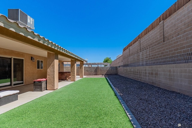 10237 S Monsoon Ave, Yuma, AZ 85365 - fenced backyard with a patio