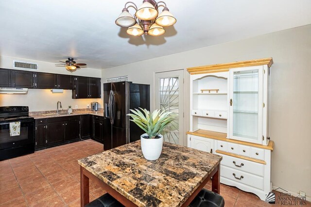 1878 S Meadowbrook Ave, Yuma, AZ 85364 - kitchen featuring black appliances, a sink, ventilation hood, a chandelier, and a ceiling fan