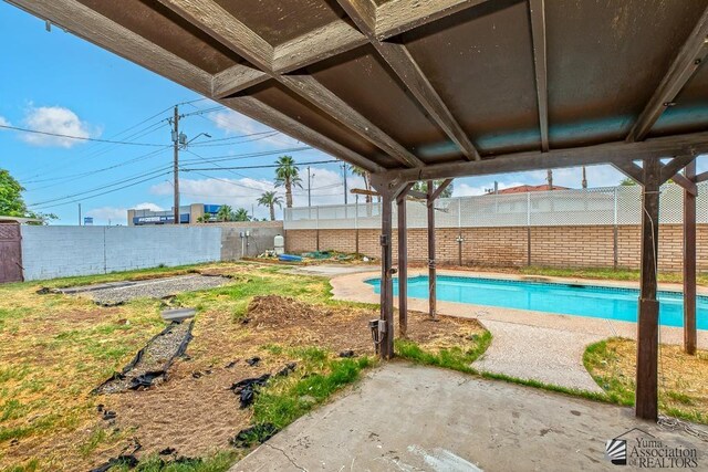 1878 S Meadowbrook Ave, Yuma, AZ 85364 - view of pool with a fenced backyard and a patio area