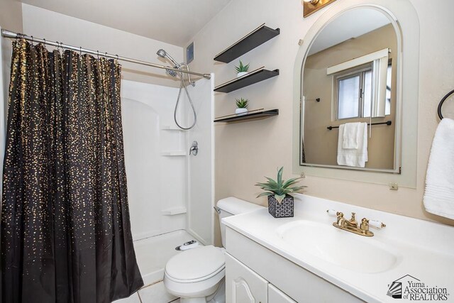 1878 S Meadowbrook Ave, Yuma, AZ 85364 - full bath featuring toilet, vanity, and a shower with shower curtain