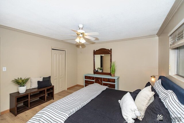 1878 S Meadowbrook Ave, Yuma, AZ 85364 - bedroom featuring light wood-type flooring, crown molding, a closet, ceiling fan, and baseboards
