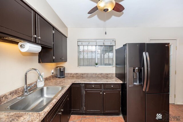 1878 S Meadowbrook Ave, Yuma, AZ 85364 - kitchen with fridge with ice dispenser, a sink, light tile patterned floors, ceiling fan, and light countertops