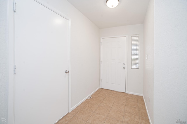 11250 E 25th Pl, Yuma, AZ 85367 - hall featuring baseboards and light tile patterned floors
