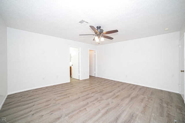 11250 E 25th Pl, Yuma, AZ 85367 - unfurnished room with wood finished floors, ceiling fan, and baseboards