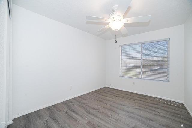 11250 E 25th Pl, Yuma, AZ 85367 - empty room with wood finished floors, a ceiling fan, and baseboards