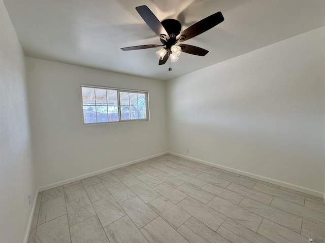 2039 S 11th Ave, Yuma, AZ 85364 - empty room with a ceiling fan and baseboards