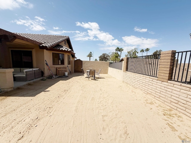 view of yard with a fenced backyard and a patio area
