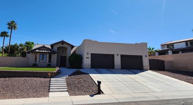 1404 W Parkway Dr, Yuma, AZ 85364 - view of front facade featuring an attached garage, concrete driveway, and stucco siding