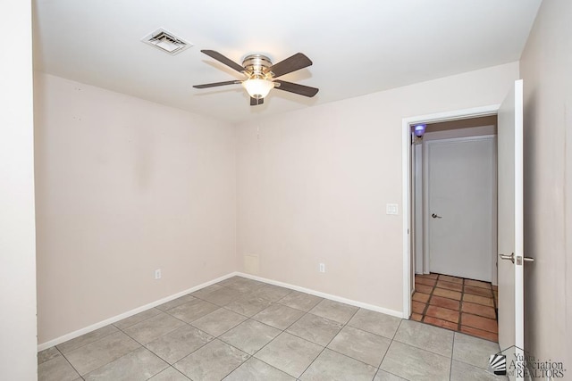 1508 W 14th St, Yuma, AZ 85364 - empty room featuring a ceiling fan, light tile patterned floors, and baseboards