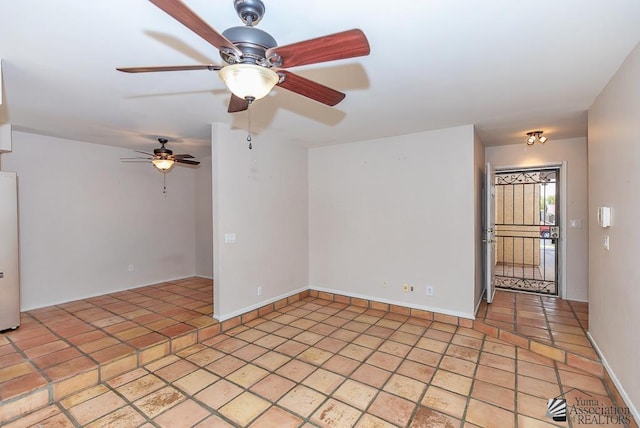 1508 W 14th St, Yuma, AZ 85364 - unfurnished room featuring ceiling fan and baseboards