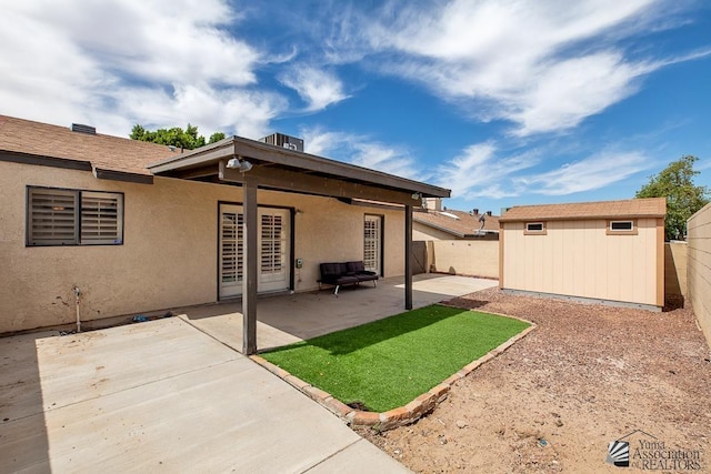 1508 W 14th St, Yuma, AZ 85364 - back of property featuring a fenced backyard, a patio area, and stucco siding
