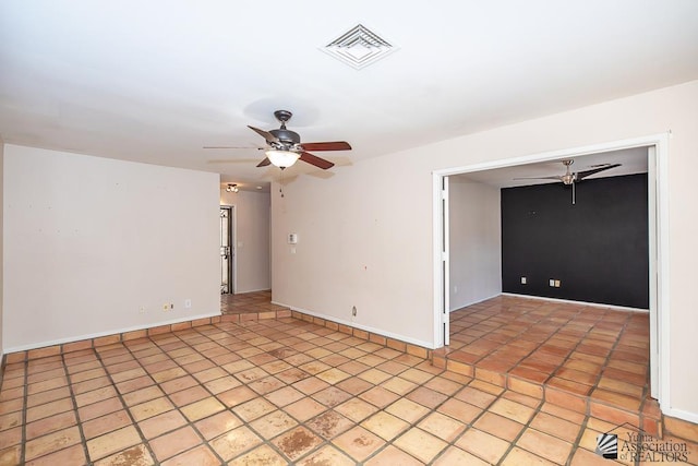 1508 W 14th St, Yuma, AZ 85364 - spare room with a ceiling fan and baseboards