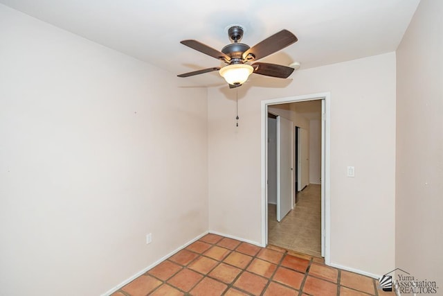 1508 W 14th St, Yuma, AZ 85364 - unfurnished room featuring ceiling fan, light tile patterned flooring, and baseboards