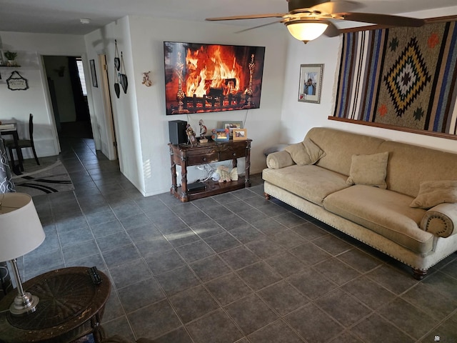1904 E 26th Pl, Yuma, AZ 85365 - living room with ceiling fan and dark tile patterned flooring