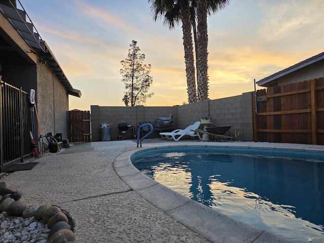 1904 E 26th Pl, Yuma, AZ 85365 - view of pool featuring a fenced backyard, a gate, and a patio