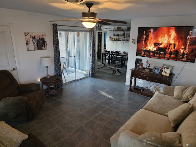 1904 E 26th Pl, Yuma, AZ 85365 - living area with ceiling fan and dark tile patterned floors