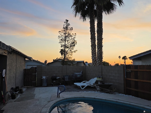 1904 E 26th Pl, Yuma, AZ 85365 - view of pool featuring a fenced backyard, a patio area, and a gate