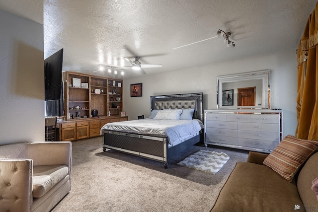 10538 S Del Vista Dr, Yuma, AZ 85367 - carpeted bedroom featuring a textured ceiling, track lighting, and a ceiling fan