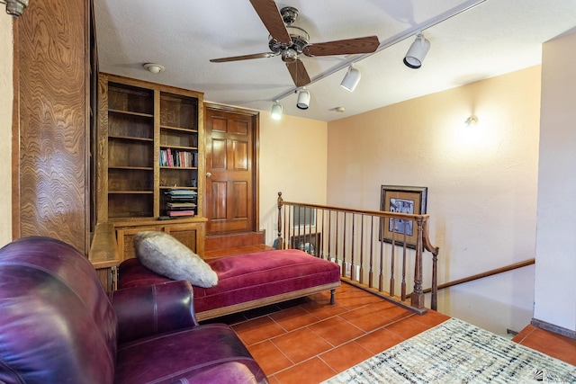 10538 S Del Vista Dr, Yuma, AZ 85367 - living area featuring track lighting, ceiling fan, an upstairs landing, and tile patterned flooring
