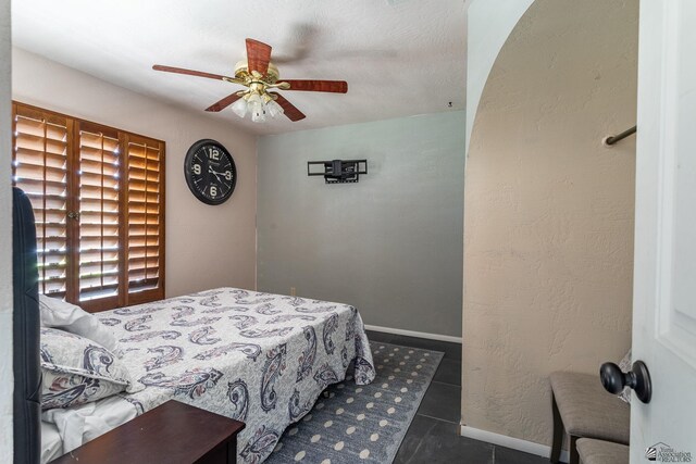 10538 S Del Vista Dr, Yuma, AZ 85367 - bedroom with tile patterned flooring, baseboards, and a ceiling fan