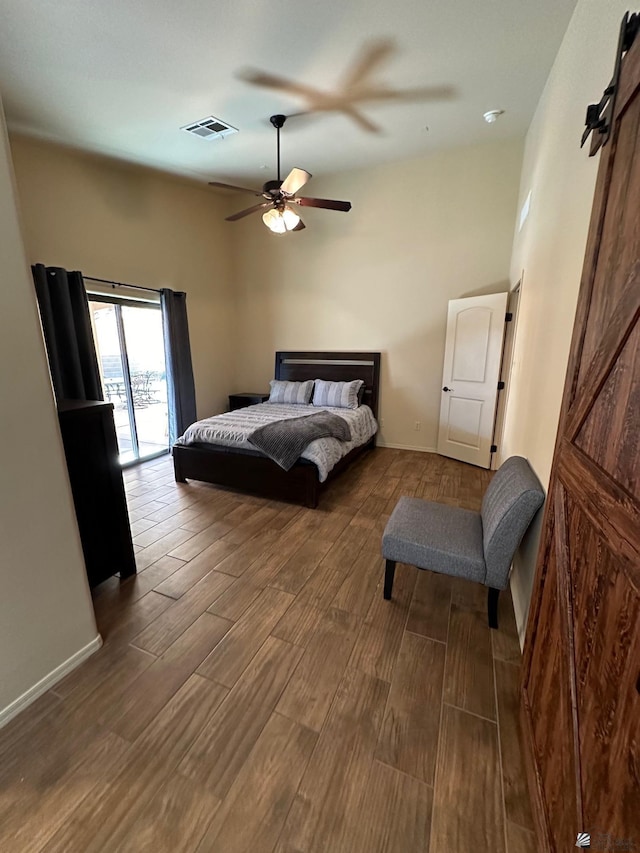 4441 W 13th St, Yuma, AZ 85364 - bedroom featuring access to outside, ceiling fan, baseboards, wood finished floors, and visible vents