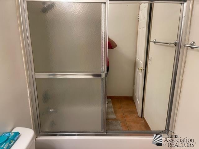 1671 W Del Oro Ln, Yuma, AZ 85364 - full bathroom with toilet, combined bath / shower with glass door, and tile patterned flooring