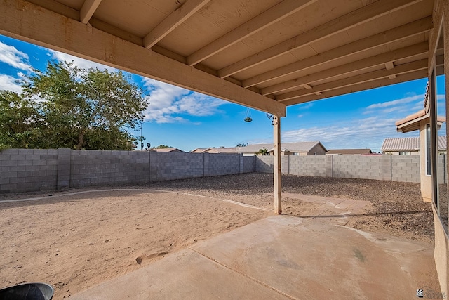 view of yard with a fenced backyard and a patio area