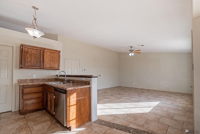 kitchen with brown cabinetry, a peninsula, ceiling fan, a sink, and dishwasher