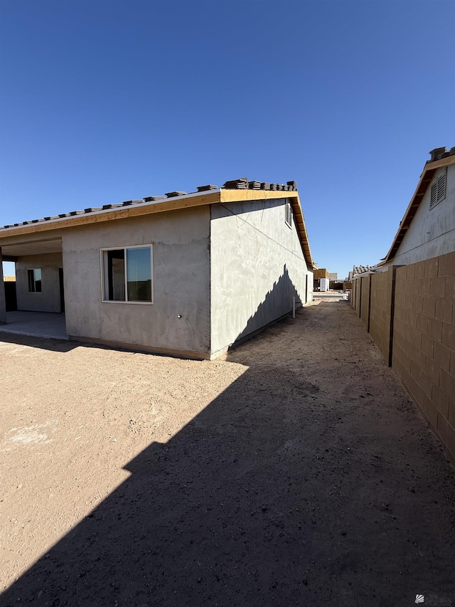 12649 W 51st Pl, Yuma, AZ 85367 - rear view of house with stucco siding