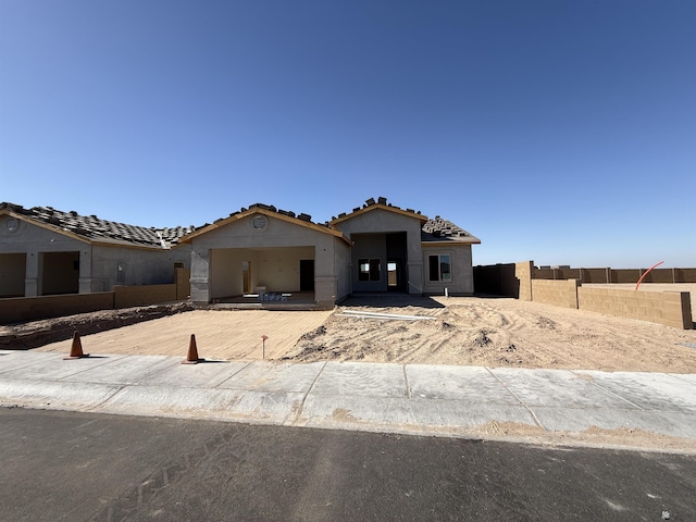 12649 W 51st Pl, Yuma, AZ 85367 - unfinished property featuring a tiled roof and stucco siding