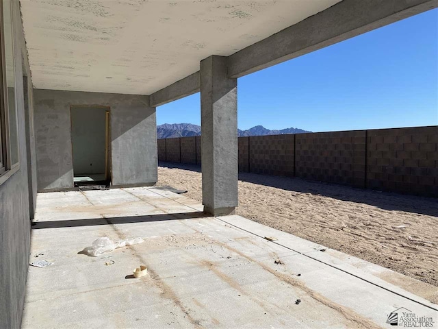 12649 W 51st Pl, Yuma, AZ 85367 - fenced backyard with a patio and a mountain view
