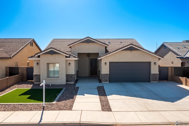 3562 S Sage Ave, Yuma, AZ 85365 - single story home with a garage, stucco siding, stone siding, and concrete driveway