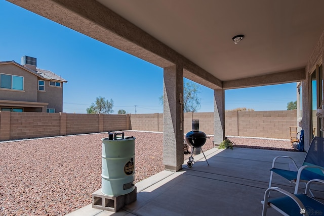 6533 E 35th Pl, Yuma, AZ 85365 - fenced backyard with a patio area and a grill